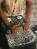 Buy A Cora Woman Grinds Corn for Tortillas at AllPosters.com
