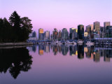City Skyline at Dusk Reflected in Coal Harbour Vancouver, British Columbia, Canada