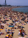 Crowded Beach of Platja De La Nova Icaria, Barcelona, Spain