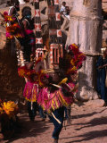 Masked Dancers Perform a 