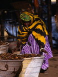 Local Woman Setting Up to Sell Dried Fish in Mopti Harbour, Mopti, Mali