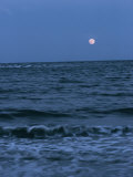 Buy A Twilight Shot of Waves Coming into Shore with the Moon in the Background at AllPosters.com