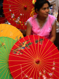 Buy Water Dai Woman with Colourful Umbrellas, Xishuangbanna, China at AllPosters.com