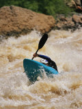 Buy Kayaker Paddles Through Colorado River Rapids at AllPosters.com
