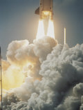 Buy Fiery Exhaust Comes from the Booster Rocket Carrying the Columbia at AllPosters.com
