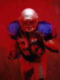 Portrait of an American Football Player Standing in a Tackle Pose