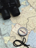 Compass on a Map with a Pair of Binoculars