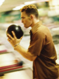 Buy Side Profile of a Young Man Holding a Bowling Ball at AllPosters.com