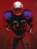 Portrait of an American Football Player Standing in a Tackle Pose
