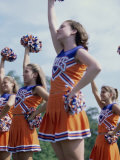 Side Profile of Cheerleaders with Pom-Poms