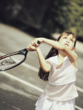 Girl Playing Tennis