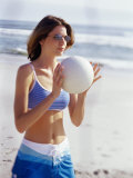 Buy Young Woman Holding a Volleyball at AllPosters.com