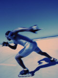 Side Profile of a Young Man Inline Skating