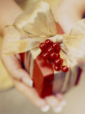 Buy Woman's Hands Holding Gift at AllPosters.com