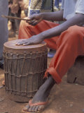 Playing a Congolese Drum in a Congolese Refugee Camp, Tanzania