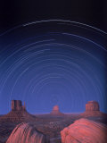 Star Trails Over Desert Landscape
