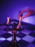 Hand Moving Chess Piece
