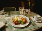 A Fruit Plate of Pineapple, Kiwi, Papaya, Grapes, Apple, and Watermelon