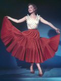 Buy She Holds out Her Red Full Circle Skirt at AllPosters.com