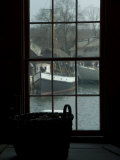 Buy Looking Out Through a Window at Wooden Fishing Boats on a River at AllPosters.com