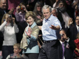 Buy President Bush, Right, and First Lady Laura Bush Arrive for a Rally for Texas Governor Rick Perry at AllPosters.com