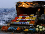 Buy A Palestinian Fruit and Vegetable Vendor Waits for Customers at AllPosters.com