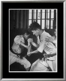 Buy Japanese Karate Student Breaking Boards with Punch at AllPosters.com