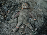 Mud-Covered Doll at a South Florida Landfill