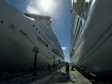 Two Cruise Ships on Either Side of a Dock on a Caribbean Island