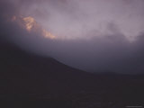 Buy The Evening Light Falls on Mount Lhotse Through the Clouds at AllPosters.com