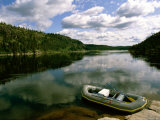 The Serene Water of the Great Whale River Beautifully Reflects the Landscape of Clouds Above