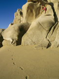 A Climber Bouldering on a Beach Formation at Cabo San Lucas
