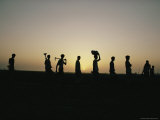 Buy Laborers Silhouetted against the Setting Sun at AllPosters.com