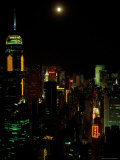 The Moon over the City Lights of Hong Kong