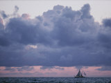 Buy Distant Sailboat under Dramatic Clouds at AllPosters.com