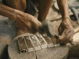 Buy Worker Hammers Silver Ingots at AllPosters.com