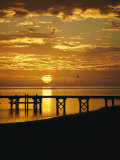 Buy Sunset over a Silhouetted Dock at AllPosters.com