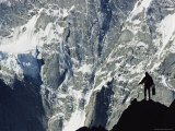 A Climber Silhouetted against Mountains in the Karakoram Range