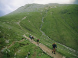 A Team of Hikers Climb Scotlands Ben Nevis Peak