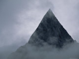 The Naysar Peak in the Karakoram Range Rises Through the Clouds
