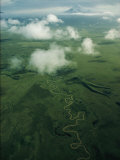 Buy A River Snakes Across the Tundra Toward Distant Mount Shishaldin at AllPosters.com