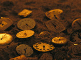 Old Watch Faces in Sand