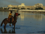A Boy on Horseback Rides Along Jeddahs Waterfront