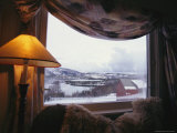 Buy A Draped Window Frames Natures Snow-Covered Beauty Outside at AllPosters.com