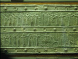 An Assyrian Relief Sculpture Depicting Archers, a Battering Ram and Impaled Prisoners