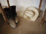 Buy Cowboy Boots and Hat Lie under a Table at AllPosters.com