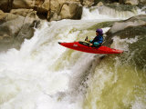 Buy A Kayaker Careens over a Waterfall into the Swirling Whitewater Below at AllPosters.com