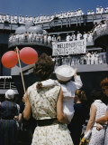 Family Members Welcome Home the U.S.S. Forrestal, an Aircraft Carrier