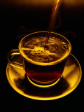 Close View of Coffee Being Poured into a Glass Cup