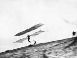 Buy View of a Biplane Glider Taking Flight at AllPosters.com